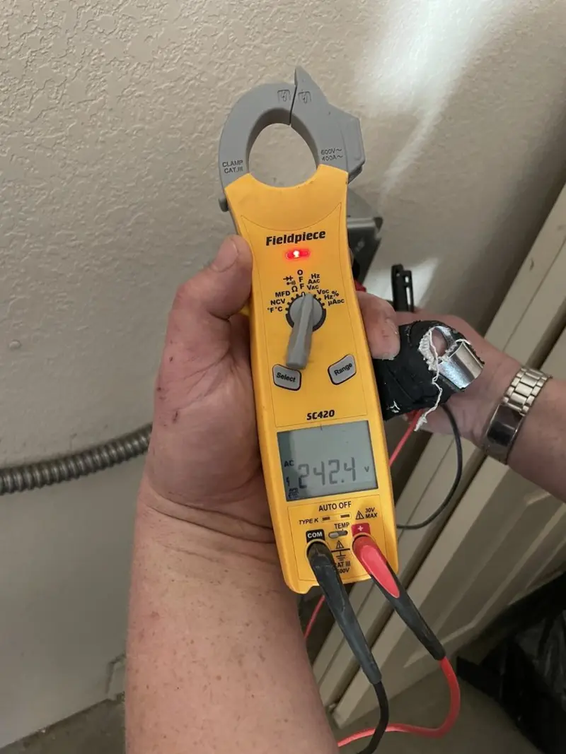 Voltage testing with clamp meter during Electrical Installation Services in Polk City